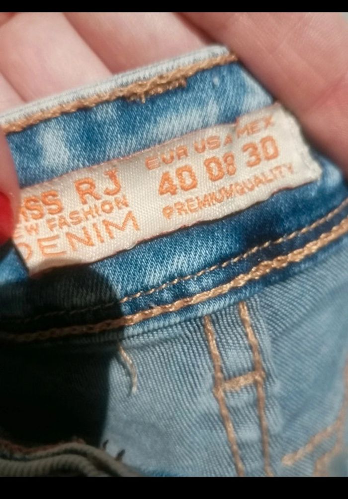 Mini short jeans T 40 🩳 - photo numéro 11