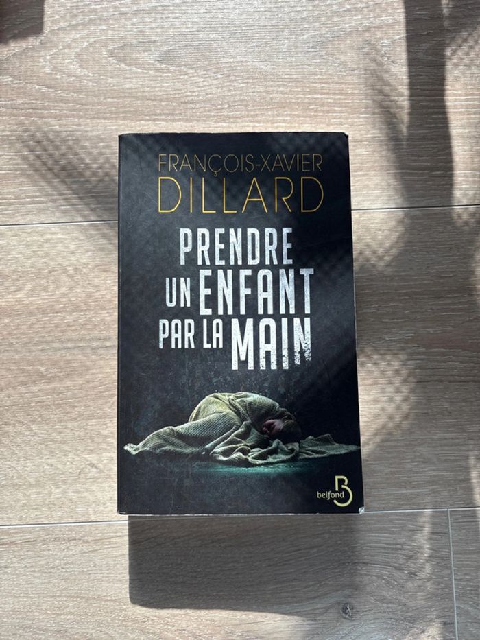 Prendre un enfant par la main livre