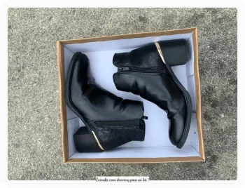 Bottines noires avec liseret doré