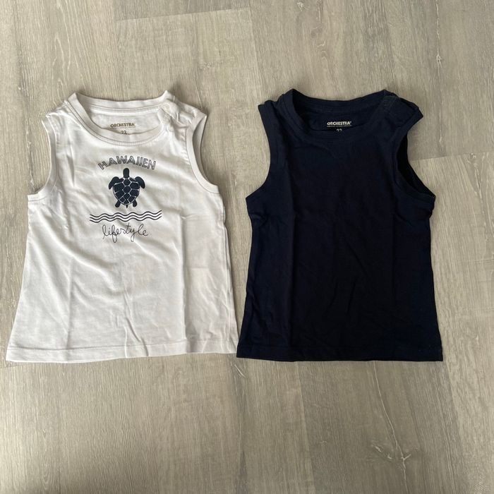 2 débardeurs