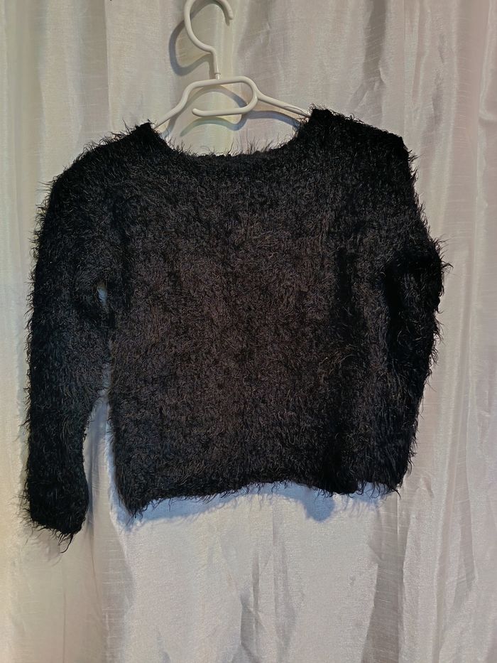 pull noir de La Halle 10 ans réf 81 D19