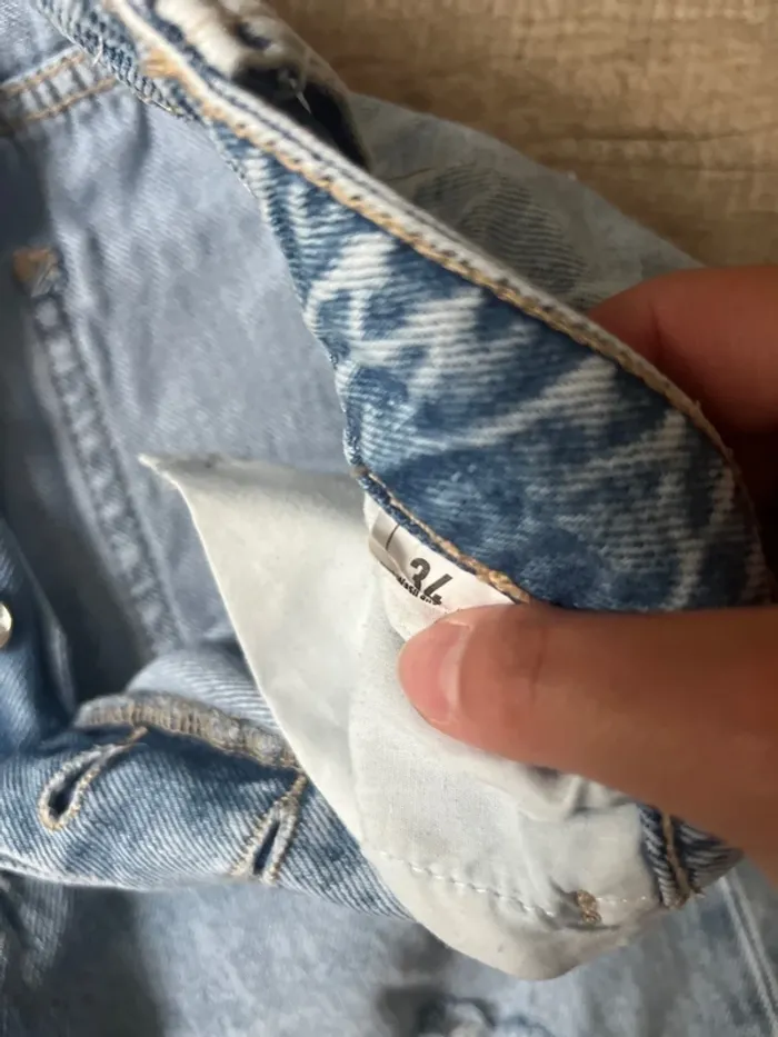 Jeans trouée - photo numéro 3