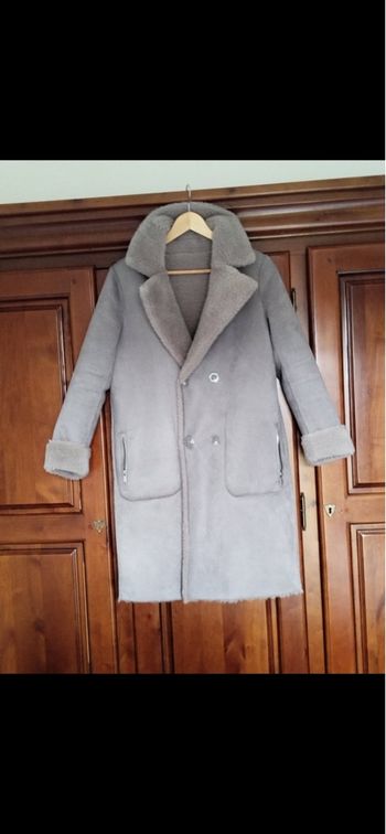 Magnifique manteau réversible neuf