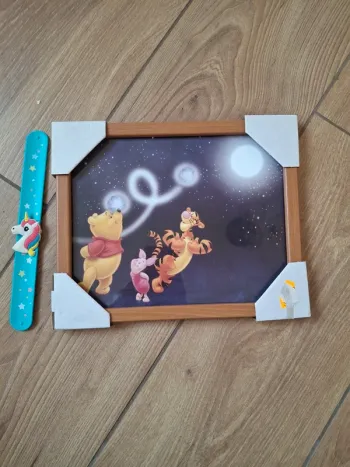 Cadre en verre Winnie l'ourson neuf 22X27
