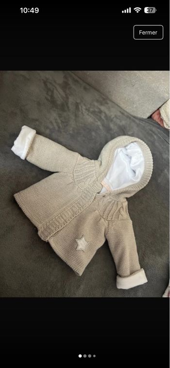 Gilet 1 mois , très bon état