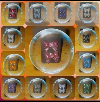 Boucle d'oreille noeux papillon