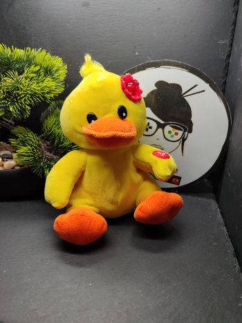 Doudou peluche sonore canard jaune orange rose Windel Gmbh fleur Rouge Musical
