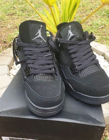 Jordan 4 black cat