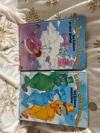 2 livres « Le village dans les nuages »
