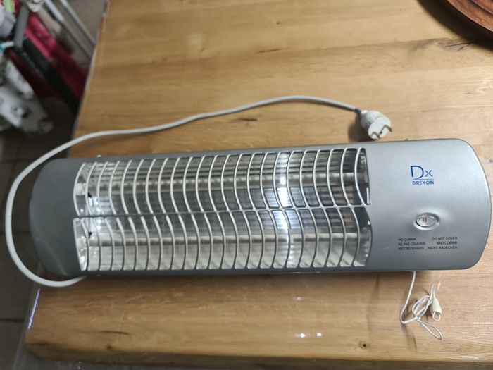 Proche du neuf chauffage mural/Réglette Radiante 1200W de la marque Drexon,