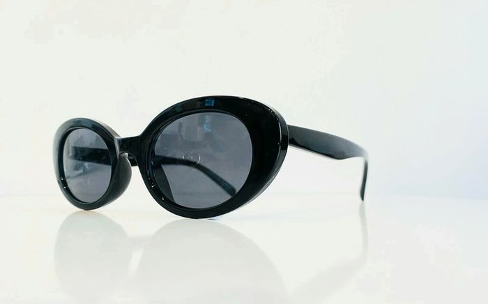 Lunette de soleil femme noire ovale UV protection catégorie 3 - photo numéro 4