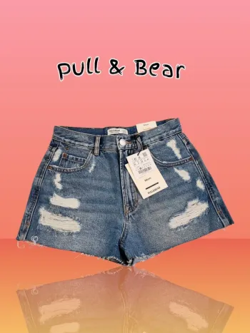 Pull & Bear short en jean déchiré * taille 36 *