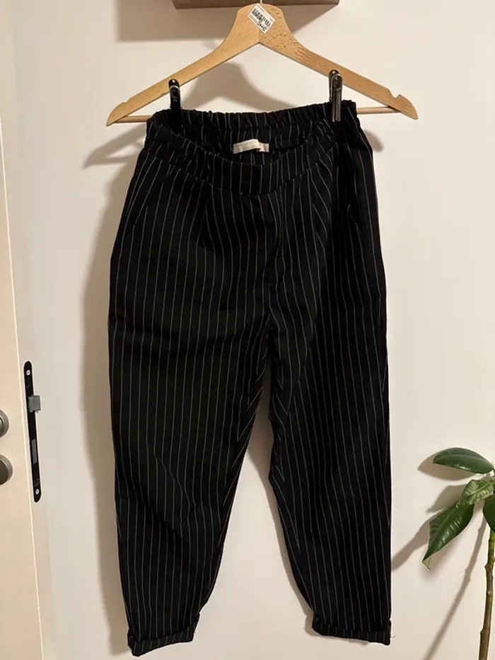 Pantalon noir rayé