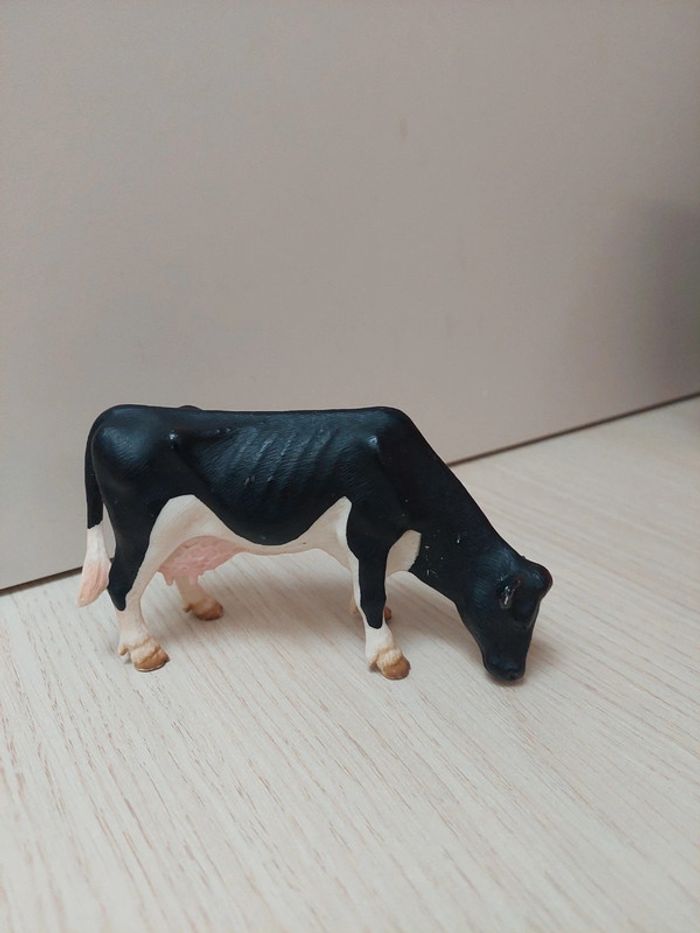 Schleich - vache Prim’Holstein broutant 13141