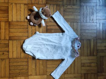 Body blanc col collerette à fleurs Cyrillus 6 mois