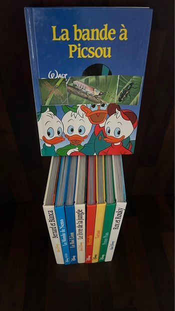 La bande a picsou Gros livre  les classiques Disney 112  pages parfait état . France loisirs