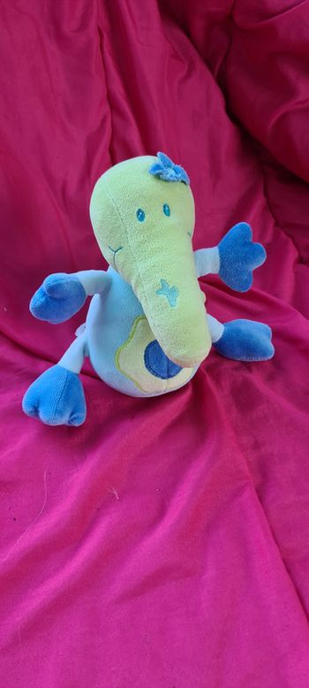 doudou babysun oiseaux dinosaure