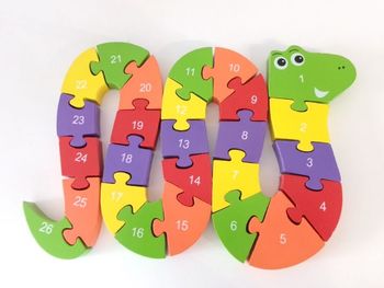 Puzzle serpent en bois
