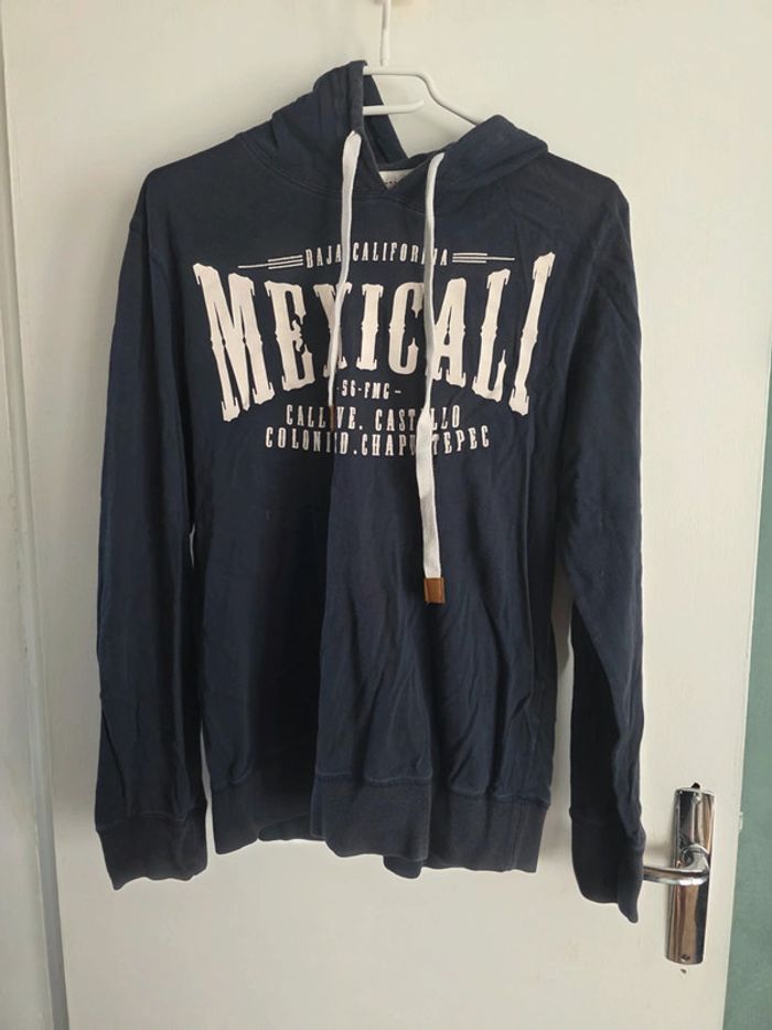 Pull taille s