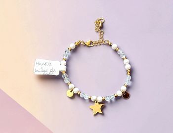 Bracelet réglable neuf howlite et cristal de roche