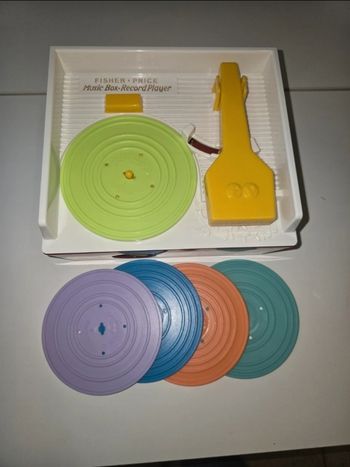 Tourne disque / boîte à musique fisher price