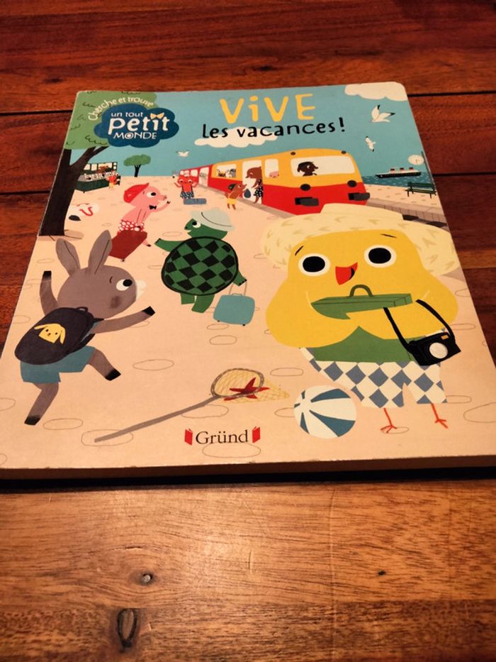 Livre cherche et trouve un tout petit monde vive les vacances grund