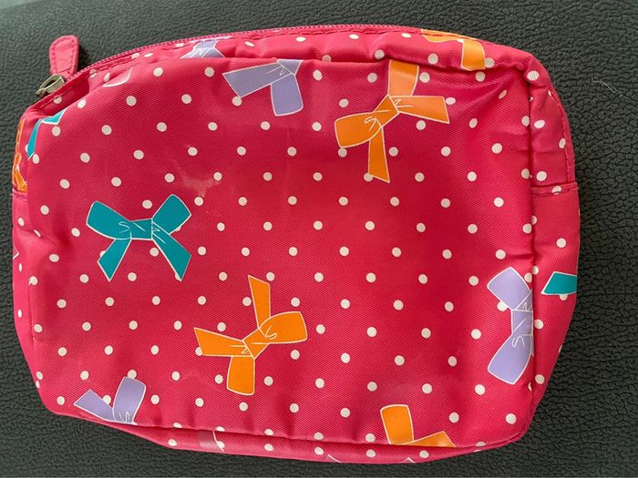 Pochette Orchestra rose à motifs