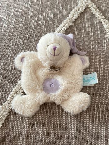 Peluche doudou plat 20cm Babynat ours blanc crème et bonnet violet très bon état