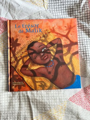 Livre jeunesse Le trésor de Malik - Neuf