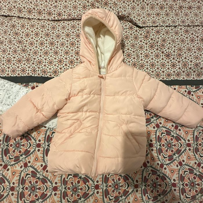 Deux. Doudounes neufs.