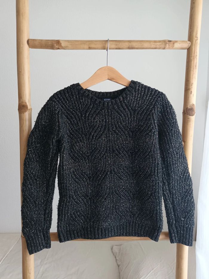 Pull noir pailleté 10 ans