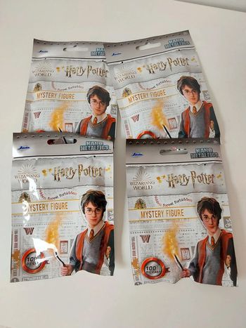 4 sachets de figurines Harry Potter