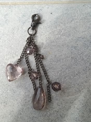 Porte clé argenté et pendentif coeur