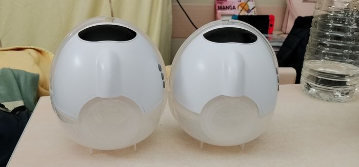 Tire lait main libre