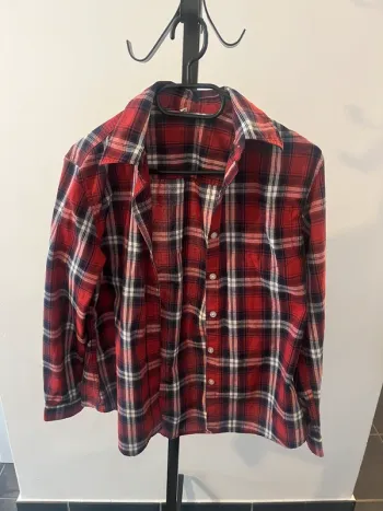 Chemise à carreaux rouge Taille 34/36.