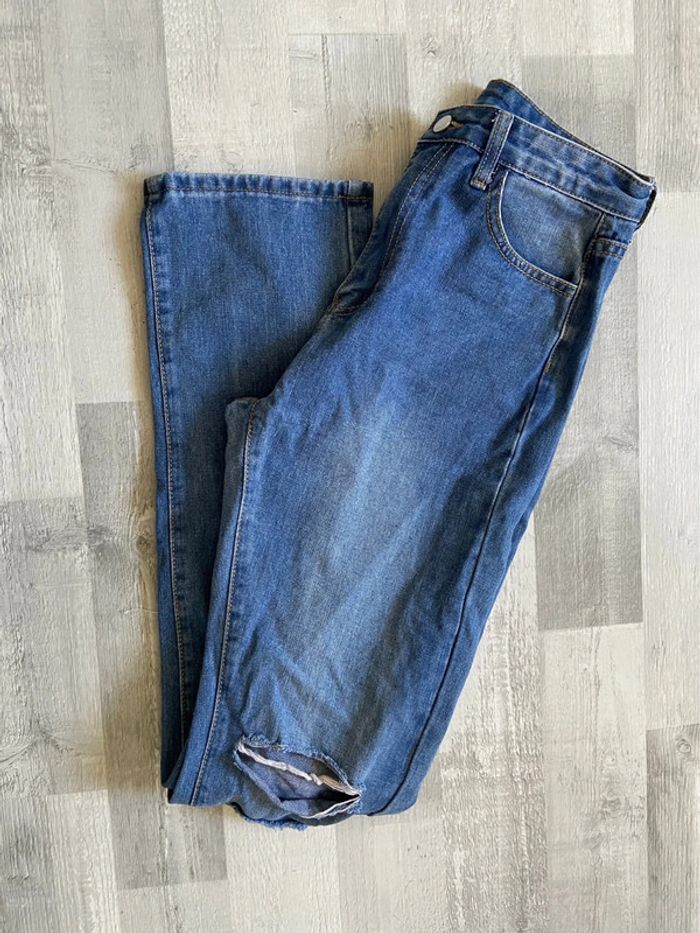 Pantalon troué - photo numéro 2
