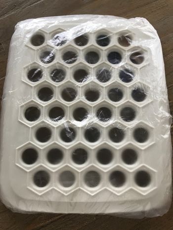 Plaque à ravioles tupperware