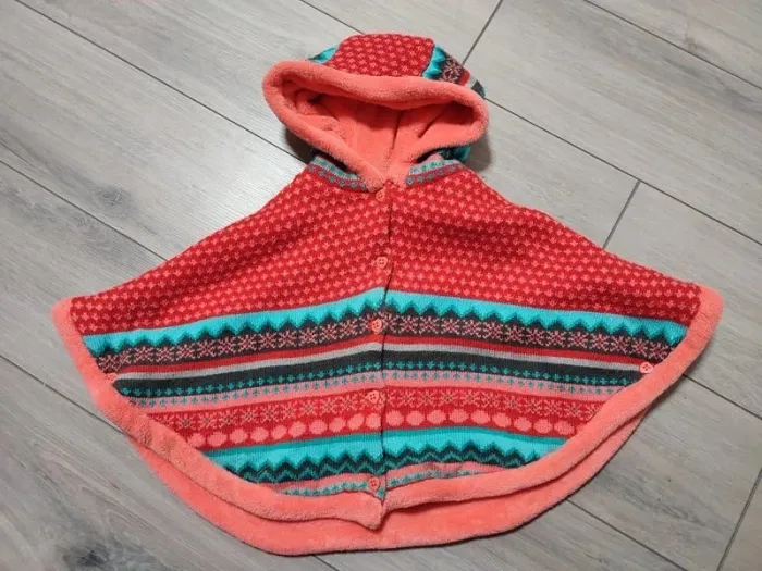 Poncho cape polaire 9 mois rouge orange inuit très bon état