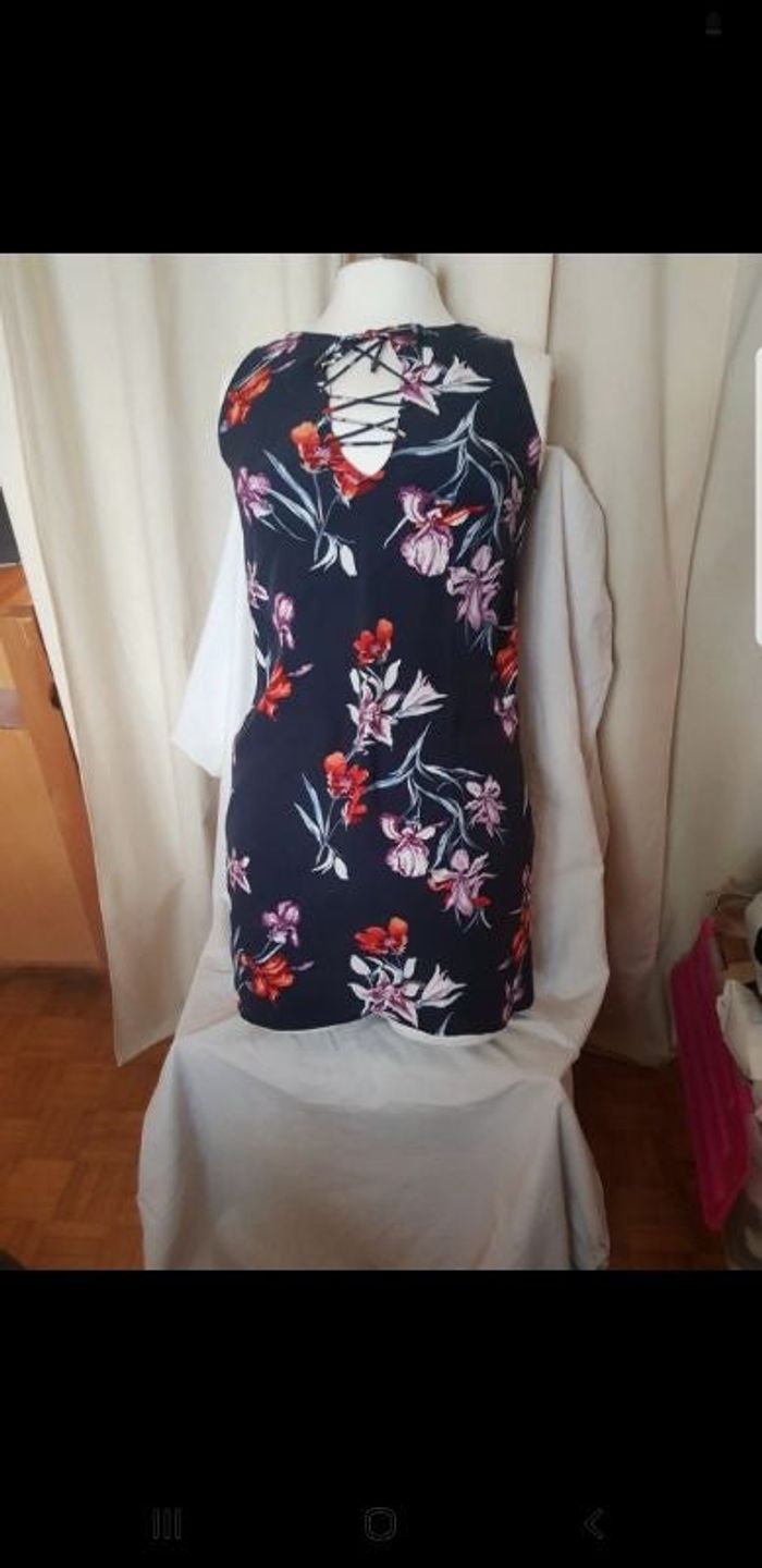 Superbe blouse sans manches