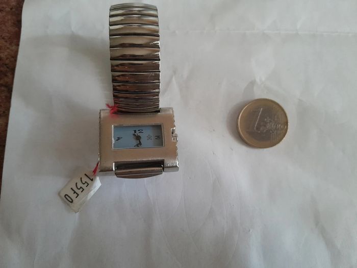 Magnifique montre bracelet extensible neuve vintage