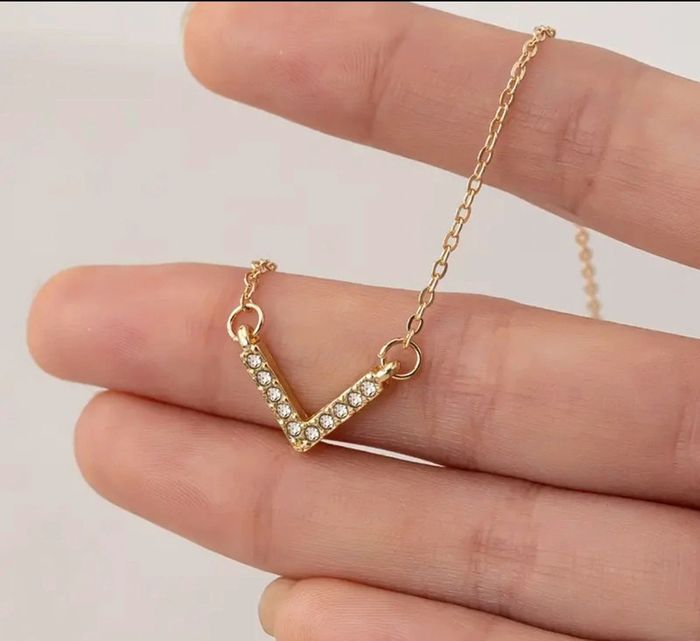 Collier , acier inoxydable, doré , neuf