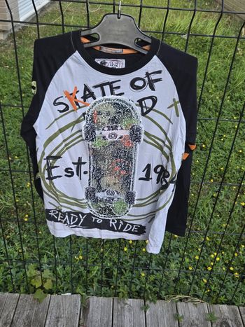 pull manche longue desigual taille 11-12 ans