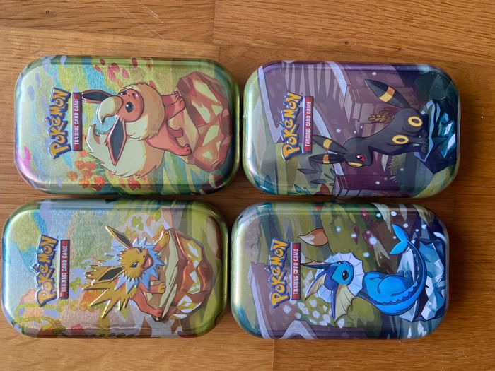 Pokémon Lot de 4 Mini tin évolutions Prismatiques