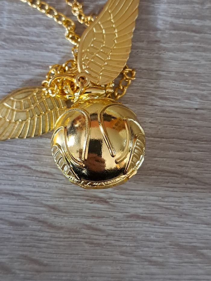 Montre pendentif Harry Potter Vif d' or vendue avec une pochette - photo numéro 5
