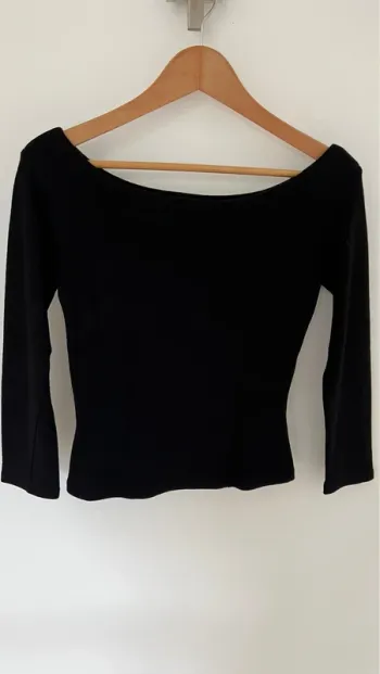Pull en mailles noir encolure bateau manches longues