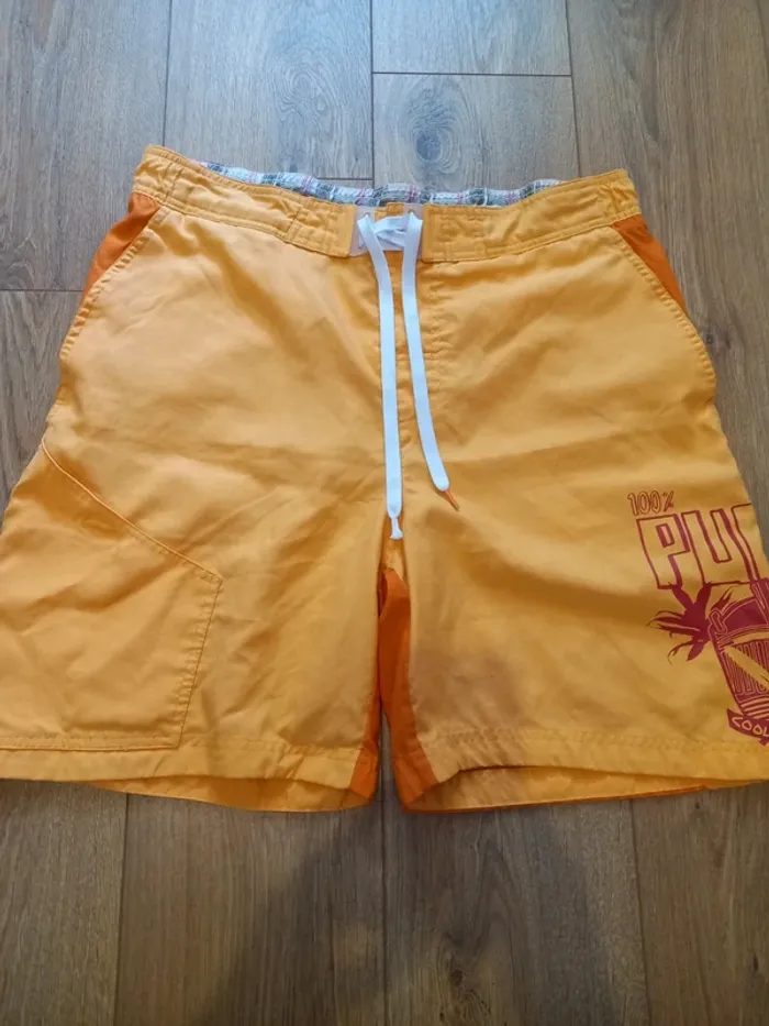 Short Puma homme L orange
