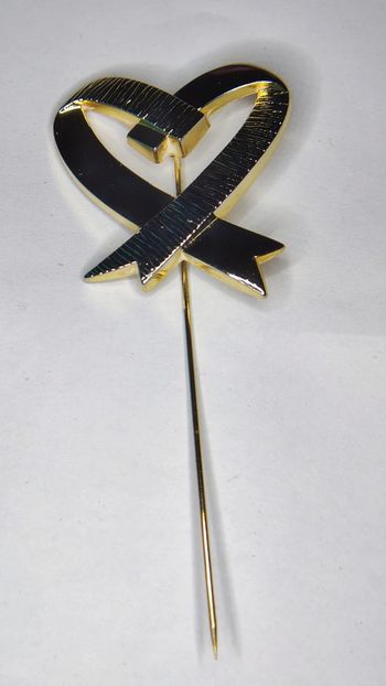 Broche ou épingle à chapeau