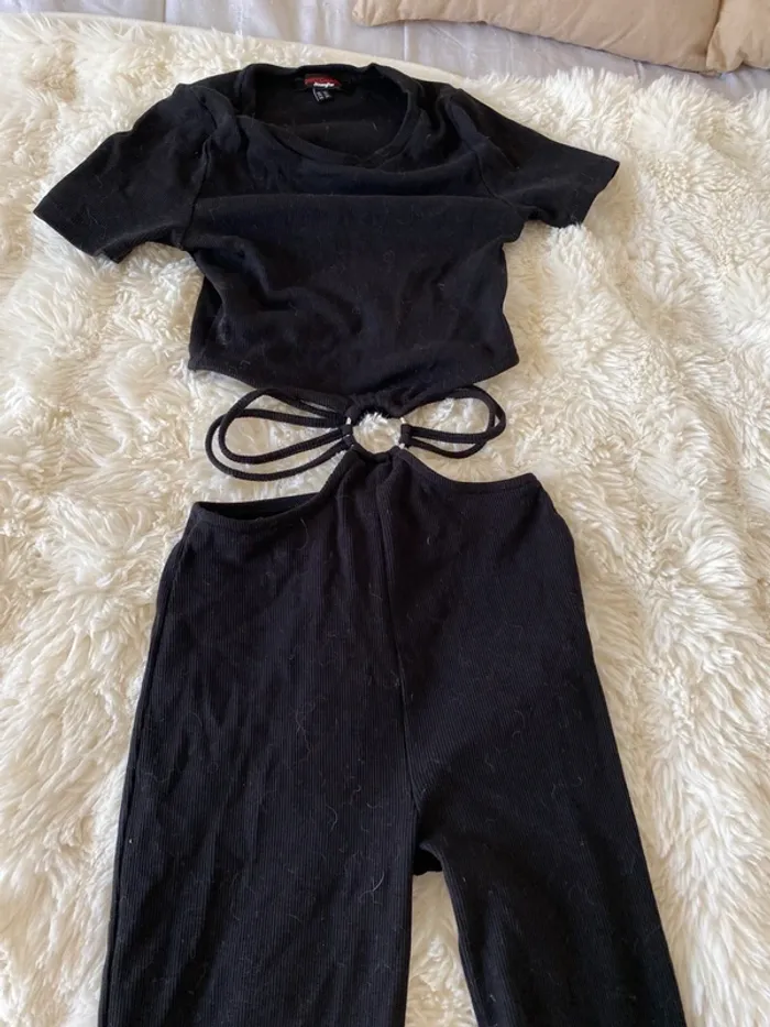 Combinaison noire ouverte au ventre Jennyfer taille XS