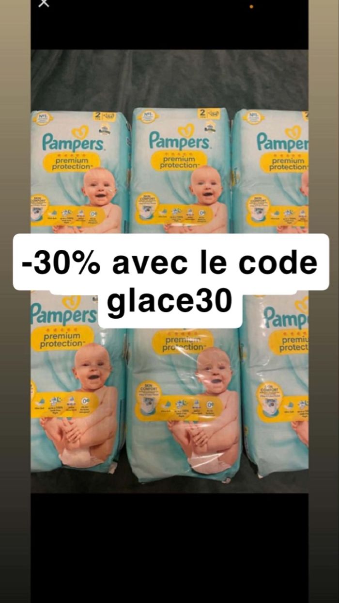 Six paquets de couches Pampers taille 2