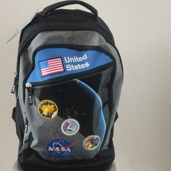 Sac à dos La plume Dorée Neuf